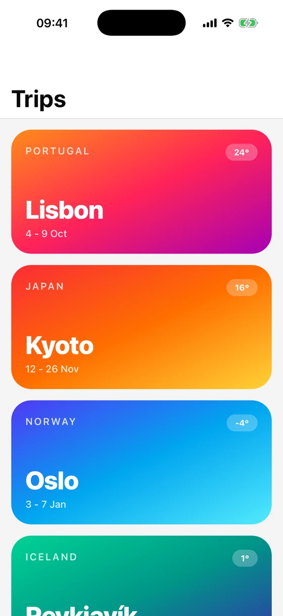 A trips list of gradient postcards in a native stack with a large title, on the iOS simulator
